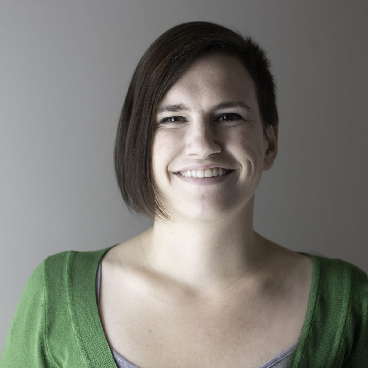 woman-smiling-green-dress