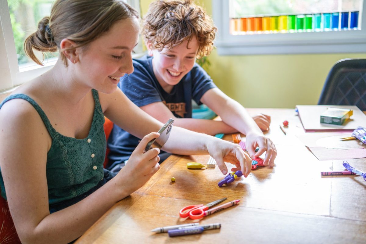 siblings-playing-with-clay